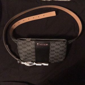 Michael Michael Kors 1X-XXL belt purse with black and Gray signature pattern.